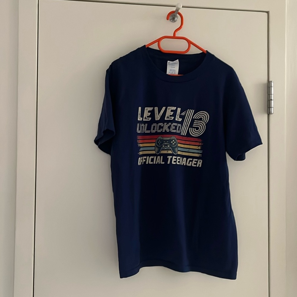 Kid’s T-shirt, size 11-12yrs. New, no tags.